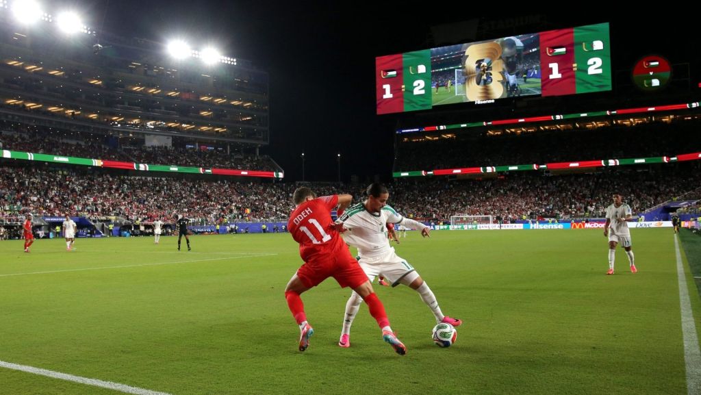 June 22, 2026; Santa Clara, California, U.S.; Algeria's Anis Hadj Moussa in action with Jordan's Odeh Fakhoury. Mandatory Credit: David Gonzales-Imagn Images