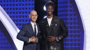 Jun 23, 2026; New York, NY, USA; NBA Commissioner poses with the first pick in the 2026 NBA draft selected by the Washington Wizards, BYU forward AJ Dybantsa at Barclays Center. Mandatory Credit: Brad Penner-Imagn Images