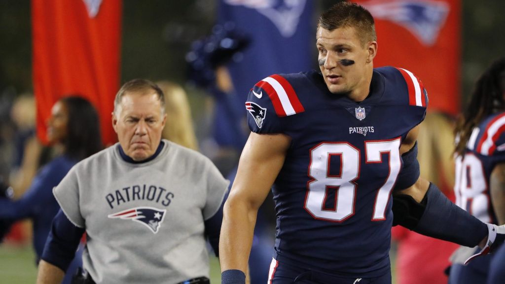 Sep 22, 2016; Foxborough, MA, USA; New England Patriots tight end Rob Gronkowski (87) and Patriots head coach Bill Belichick walk along the sidelines before their game against the Houston Texans at Gillette Stadium. Mandatory Credit: Winslow Townson-USA TODAY Sports