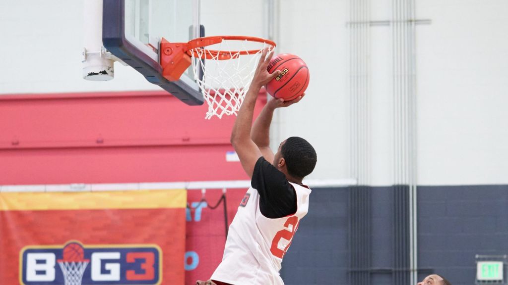 Mar 19, 2022; Scottsdale, AZ, United States; Victor Evans (26) jumps to dunk the ball at Victorium. Basketball Big3 Tryouts