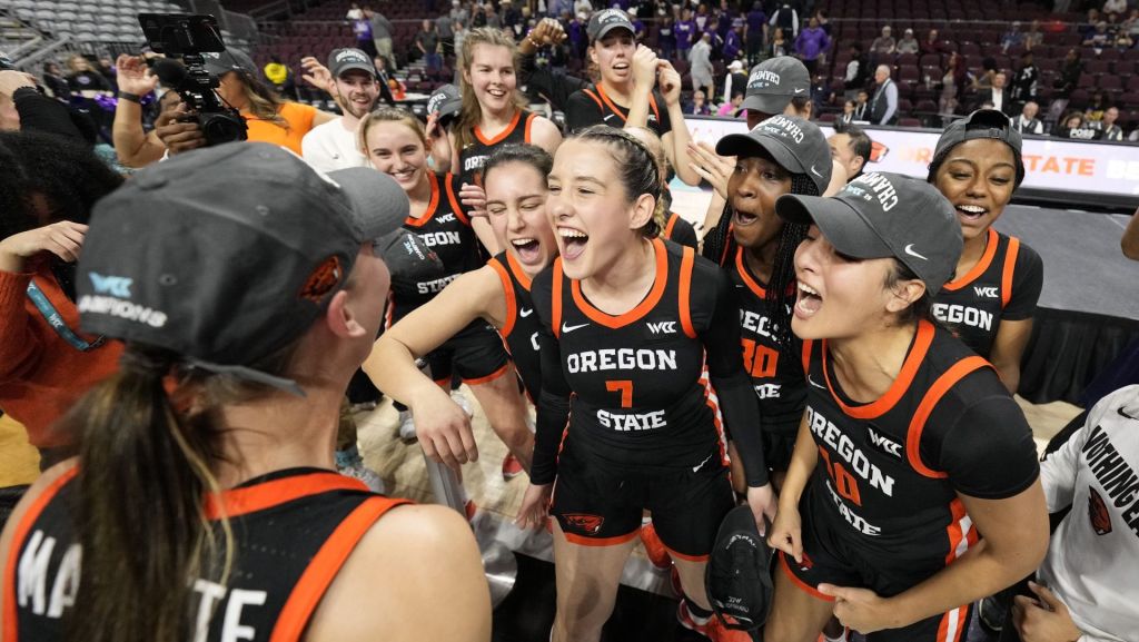 March 11, 2025; Las Vegas, NV, USA; Oregon State Beavers celebrate after defeating the Portland Pilots after the game in the final of the West Coast Conference tournament at Orleans Arena. Mandatory Credit: Kyle Terada-Imagn Images