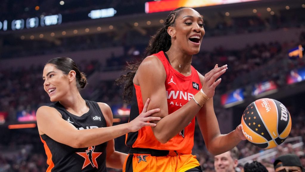 Los Angeles Sparks's Kelsey Plum (10) guards Las Vegas Aces' Aja Wilson (22) on Saturday, July 19, 2025, during the WNBA All-Star Game at Gainbridge Fieldhouse in Indianapolis.