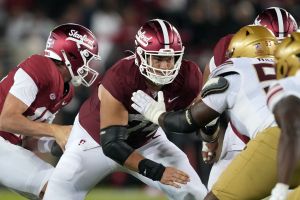 Sep 13, 2025; Stanford, California, USA; Stanford Cardinal offensive lineman Fisher Anderson (center) blocks against Boston College Eagles defensive lineman Kwan Williams (right) during the fourth quarter at Stanford Stadium.