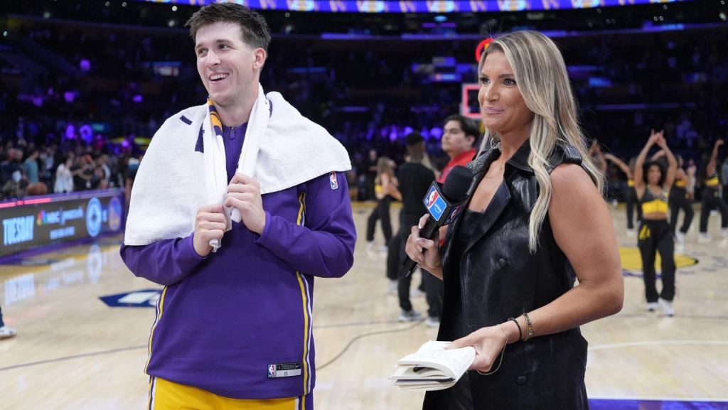Oct 24, 2025; Los Angeles, California, USA; NBA on Prime reporter Allie Clifton (right) interviews Los Angeles Lakers guard Austin Reaves (15) after the game against the Minnesota Timberwolves at Crypto.com Arena. Mandatory Credit: Kirby Lee-Imagn Images