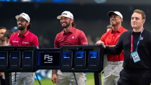 Aksha Bhatia, Max Homa, and Tiger Woods of Jupiter Links before a TGL match against New York Golf Club at SoFi Center on January 13, 2026, in Palm Beach Gardens, Florida.