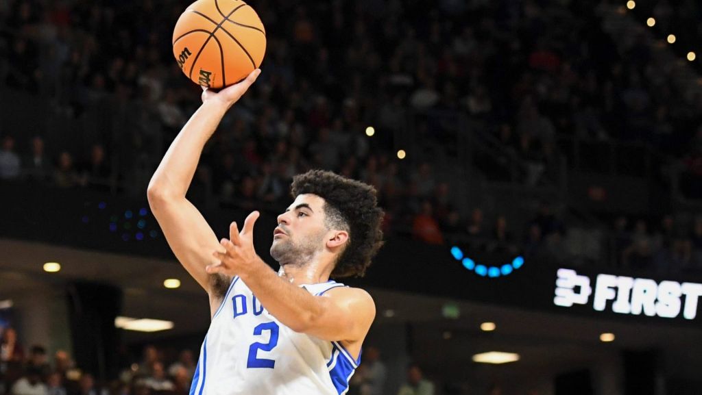 Duke Blue Devils guard Cayden Boozer (2) shoots the ball Thursday, March 19, 2026, during the NCAA Mens Basketball Tournament first round game against the Siena Saints at Bon Secours Wellness Arena in Greenville, South Carolina.