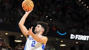 Duke Blue Devils guard Cayden Boozer (2) shoots the ball Thursday, March 19, 2026, during the NCAA Mens Basketball Tournament first round game against the Siena Saints at Bon Secours Wellness Arena in Greenville, South Carolina.