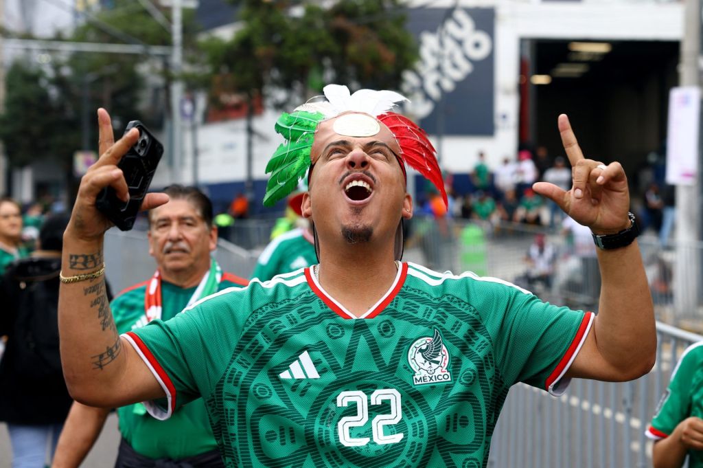 Soccer Football - FIFA World Cup 2026 - Round of 32 - Mexico v Ecuador - Estadio Azteca, Mexico City, Mexico - June 30, 2026 Mexico fan poses for a picture outside the stadium before the match