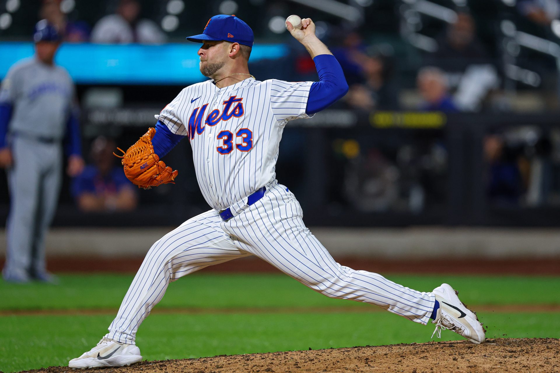 Jul 7, 2026; New York City, New York, USA; New York Mets pitcher A.J. Minter (33) delivers a pitch during the ninth inning against the Kansas City Royals at Citi Field.