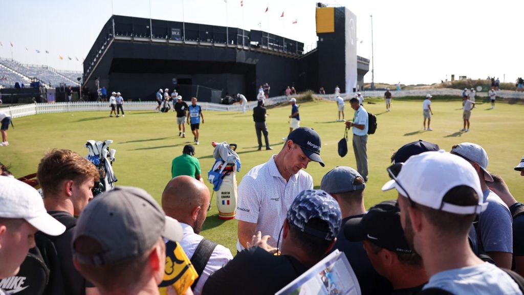 Jul 13, 2026; Southport, England; Justin Rose signs autographs alongside the practice green during a practice round for The Open Championship golf tournament at Royal Birkdale. Mandatory Credit: Bill Streicher-Imagn Images