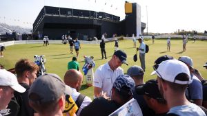 Jul 13, 2026; Southport, England; Justin Rose signs autographs alongside the practice green during a practice round for The Open Championship golf tournament at Royal Birkdale. Mandatory Credit: Bill Streicher-Imagn Images