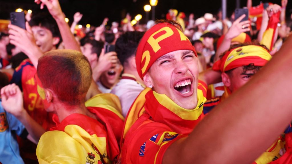 Soccer Football - FIFA World Cup 2026 - Semi Final - France v Spain - Fans gather in Madrid - Madrid, Spain - July 14, 2026 Spain fans celebrate at the fan zone in the Plaza de Colon after the match as Spain qualify for the World Cup final