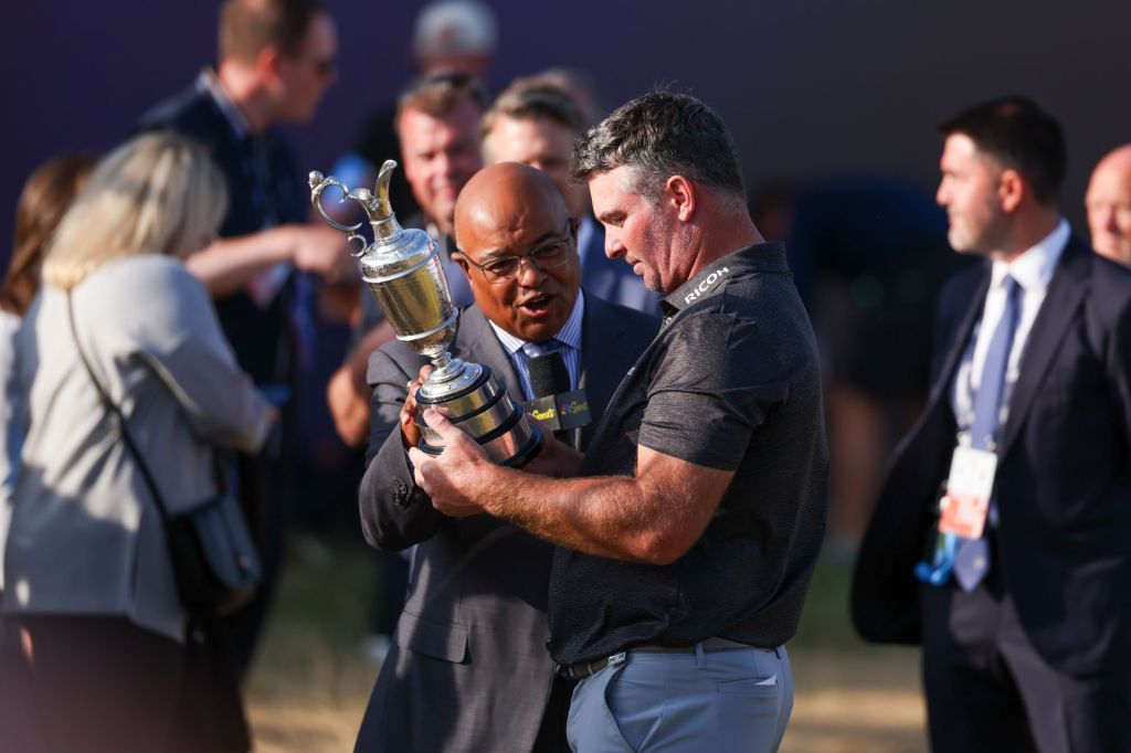Jul 19, 2026; Southport, ENG; Ryan Fox holds the Claret Jug after winning the The Open Championship golf tournament, as he is interviewed by NBCs Mike Tiroco at Royal Birkdale.