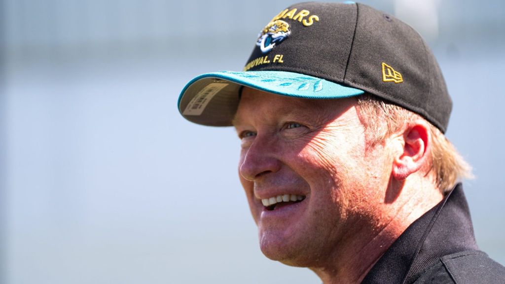 Former NFL Coache Jon Gruden have a laugh while attending an NFL training camp session ten at the Miller Electric Center, Tuesday, Aug. 5, 2025, in Jacksonville, Fla. [Doug Engle/Florida Times-Union]
