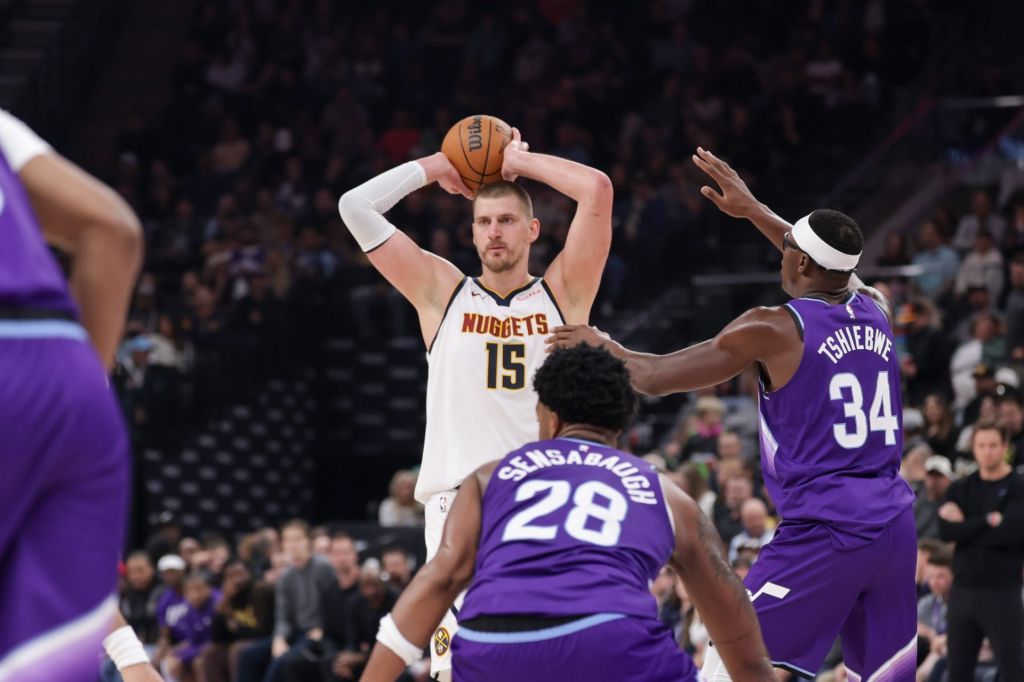 Apr 1, 2026; Salt Lake City, Utah, USA; Denver Nuggets center Nikola Jokić (15) looks to pass the ball during the second half against the Utah Jazz at Delta Center.