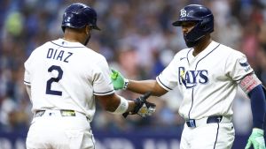 Jul 8, 2026; St. Petersburg, Florida, USA; Tampa Bay Rays third baseman Junior Caminero (13) greets designated hitter Yandy Diaz (2) after scoring a run against the New York Yankees in the third inning at Tropicana Field.