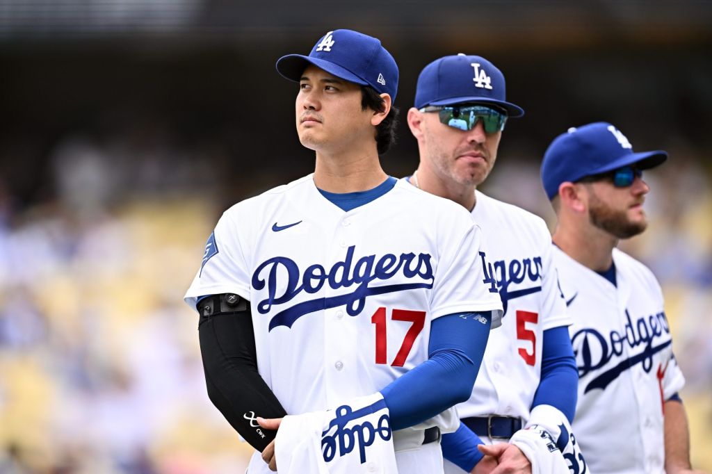 Jul 12, 2026; Los Angeles, California, USA; Los Angeles Dodgers two-way player Shohei Ohtani (17) receives his All-Star game jerseys before the game against the Arizona Diamondbacks at Dodger Stadium.
