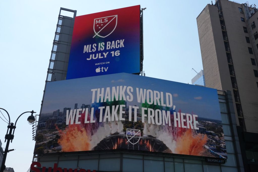 Jul 15, 2026; New York, NY, USA; A MLS and Apple TV advertisement for the FIFA World Cup 2026. Mandatory Credit: Kirby Lee-Imagn Images