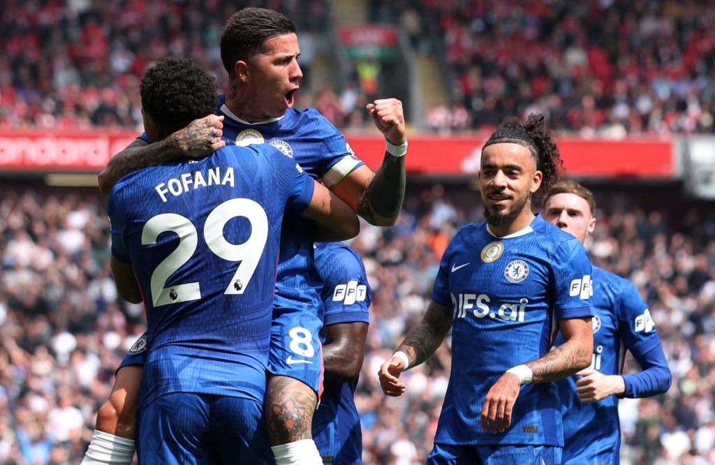 FILE PHOTO: Soccer Football - Premier League - Livepool v Chelsea - Anfield, Liverpool, Britain - May 9, 2026 Chelsea's Enzo Fernandez celebrates scoring their first goal with Wesley Fofana 