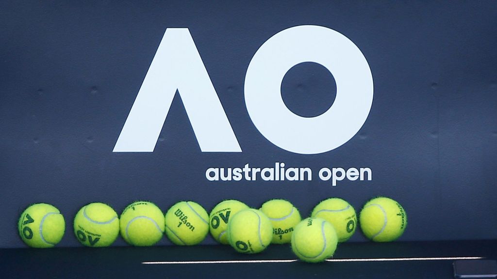 Tennis - Australian Open - Melbourne, Australia, January 14, 2018. Tennis balls are pictured in front of the Australian Open logo before the tennis tournament. REUTERS/Thomas Peter