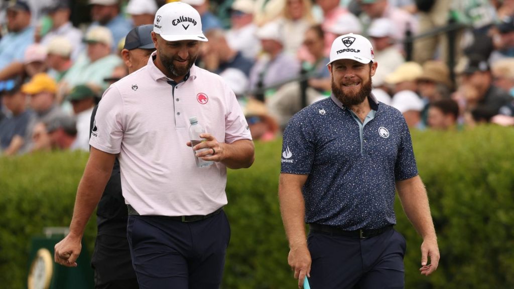 Golf - The Masters - Augusta National Golf Club, Augusta, Georgia, U.S. - April 6, 2026 England's Tyrrell Hatton and Spain's Jon Rahm on the practice range during a practice round REUTERS/Mike Segar
